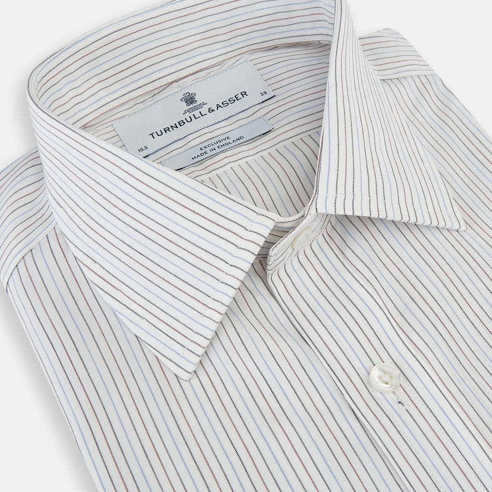 The Turnbull & Asser Red and Blue Double Pinstripe Mayfair Shirt features long sleeves, a collar, and button-up front, crafted from fine Italian cotton, displayed on a plain white background.
