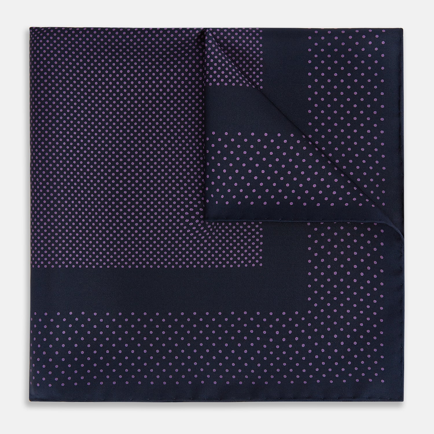 View 1 of product The Turnbull & Asser Navy and Purple Dot Silk Pocket Square features a stylish dot pattern—ideal for adding a refined touch to your look.