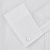 View 3 of product A neatly folded Die Another Day Inspired Voile Dress Shirt by Turnbull & Asser, featuring a classic collar and buttoned front, is displayed on a white background, evoking the timeless style of a James Bond shirt.
