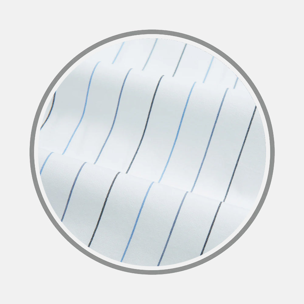 Close-up of Turnbull & Asser's Blue Wide Pinstripe Fabric, showing alternating thin black and light blue stripes on white, viewed through a circular frame against a light background.