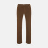 View 1 of product A pair of yellow cotton plain 5 pocket jeans by Turnbull & Asser, featuring a button and zip closure, displayed on a plain white background.