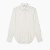 View 13 of product The Cream Silk Tailored Bianca Shirt by Turnbull & Asser features long sleeves, a pointed collar, and curved hem in soft-touch peace silk with a tailored fit. Shown laid flat on a white background.