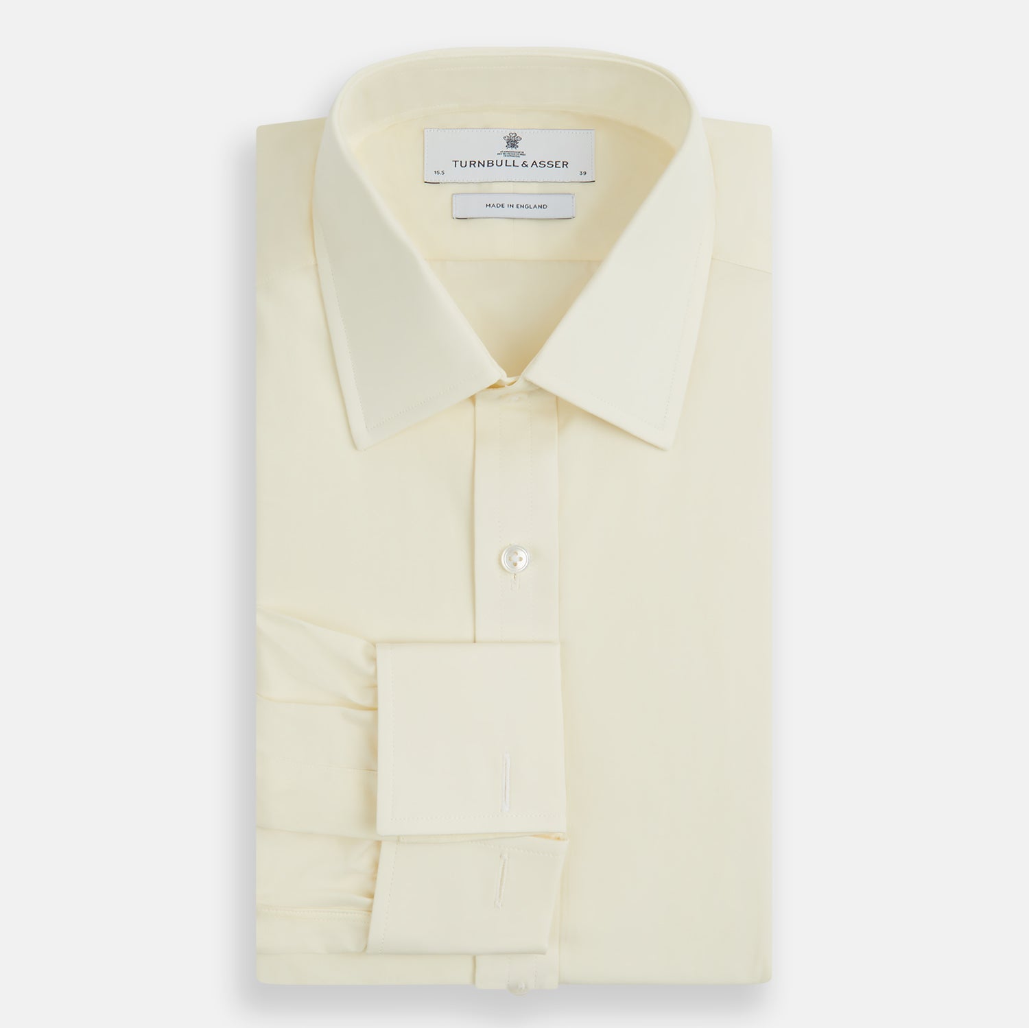View 4 of product The Cream Cotton Shirt with T&A Collar and Double Cuffs by Turnbull & Asser is shown laid flat on a white background.
