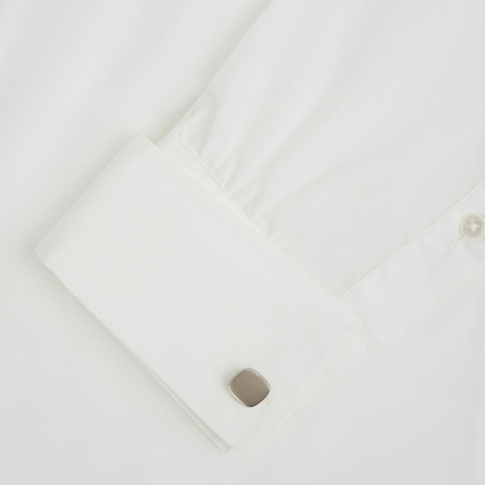 The Brushed Silver Rounded Square Cufflinks by Turnbull & Asser, shown on a plain white background, are a timeless addition to men's accessories.