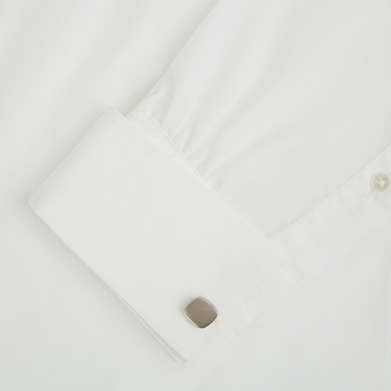 View 3 of product The Brushed Silver Rounded Square Cufflinks by Turnbull & Asser, shown on a plain white background, are a timeless addition to men's accessories.