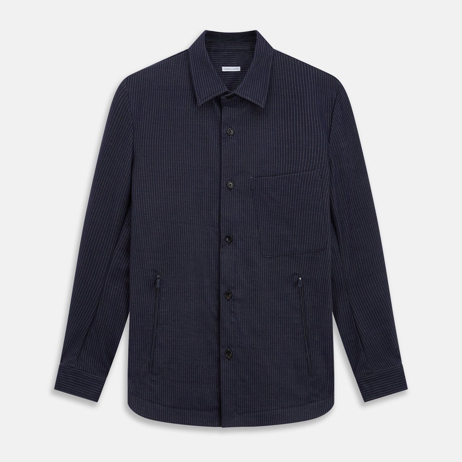 View 1 of product The Turnbull & Asser Navy Stripe Hampstead Overshirt features pinstripes, a collar, long sleeves, chest pocket, and two angled side pockets—ideal for refining your formal look. Shown laid flat on a light background.