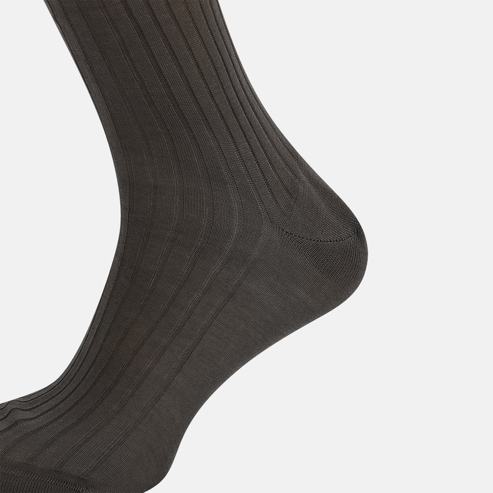 A single Concrete Grey Long Sock by Turnbull & Asser, featuring an over the calf fit and ribbed texture, is displayed on a plain white background.