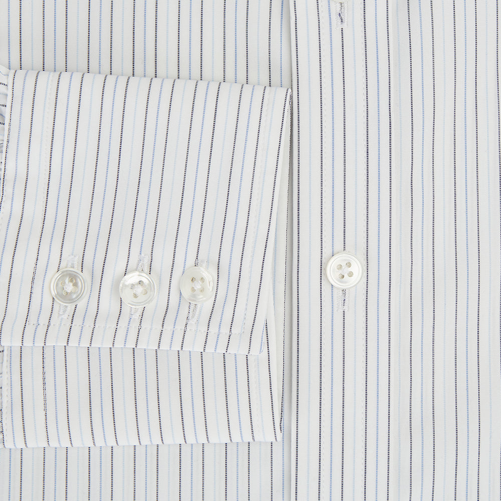 The Turnbull & Asser Blue Multi-Tone Double Pinstripe Mayfair Shirt, crafted from premium Italian cotton with a pointed collar, buttoned cuffs, and long sleeves, is shown on a plain white background.