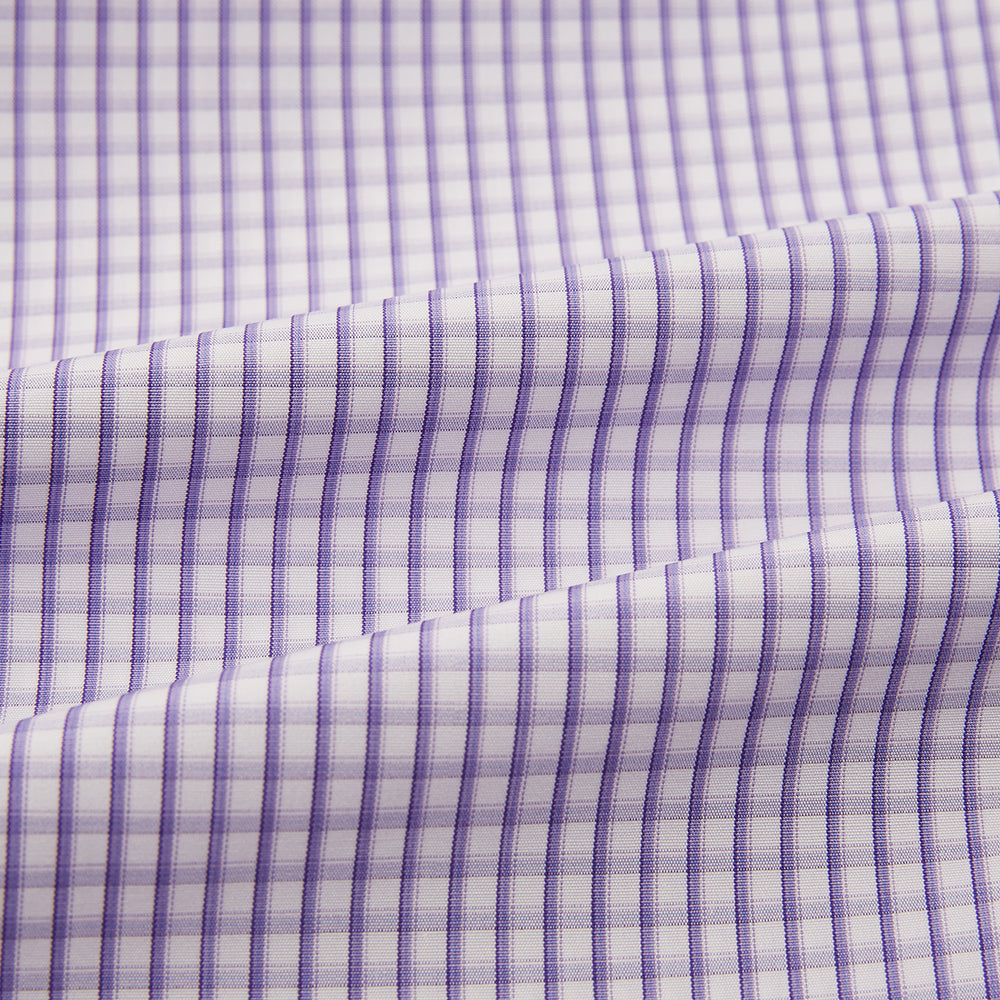 The Turnbull & Asser Purple Micro Shadow Check Mayfair Shirt features long sleeves, a classic collar, white buttons, and a subtle blue and white check pattern—perfect for formal wear and shown on a plain white background.