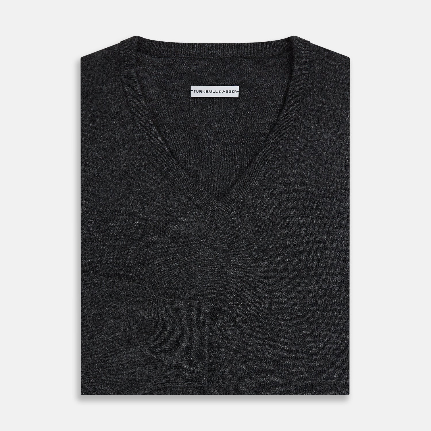 View 4 of product The Turnbull & Asser Charcoal Grey Melange V-Neck Cashmere Jumper is shown on a white background, featuring long sleeves, ribbed cuffs and hem for classic style and comfort.