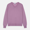 View 1 of product The Pink Merino Kennedy V-Neck Jumper by Turnbull & Asser features long sleeves with ribbed cuffs and waistband, shown on a plain white background—ideal for knitwear lovers.