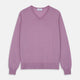 The Pink Merino Kennedy V-Neck Jumper by Turnbull & Asser features long sleeves with ribbed cuffs and waistband, shown on a plain white background—ideal for knitwear lovers.