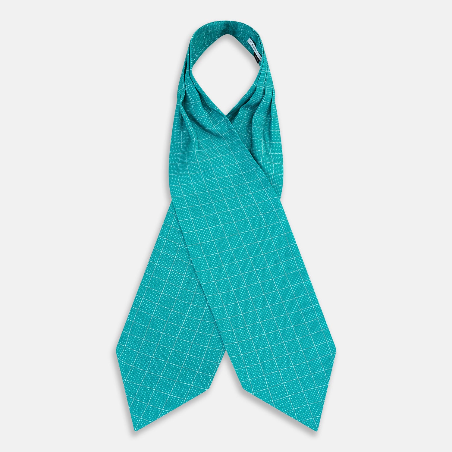 View 3 of product The Turquoise Dotted Check Pattern Printed Silk Cravat by Turnbull & Asser features a neatly folded diamond shape and a refined white dotted grid, showcasing classic style.