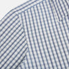 View 6 of product The Azzurro Multi Check Westminster Shirt by Turnbull & Asser is a long-sleeve, button-up with a white base and blue and gray checks, displayed flat against a white background.