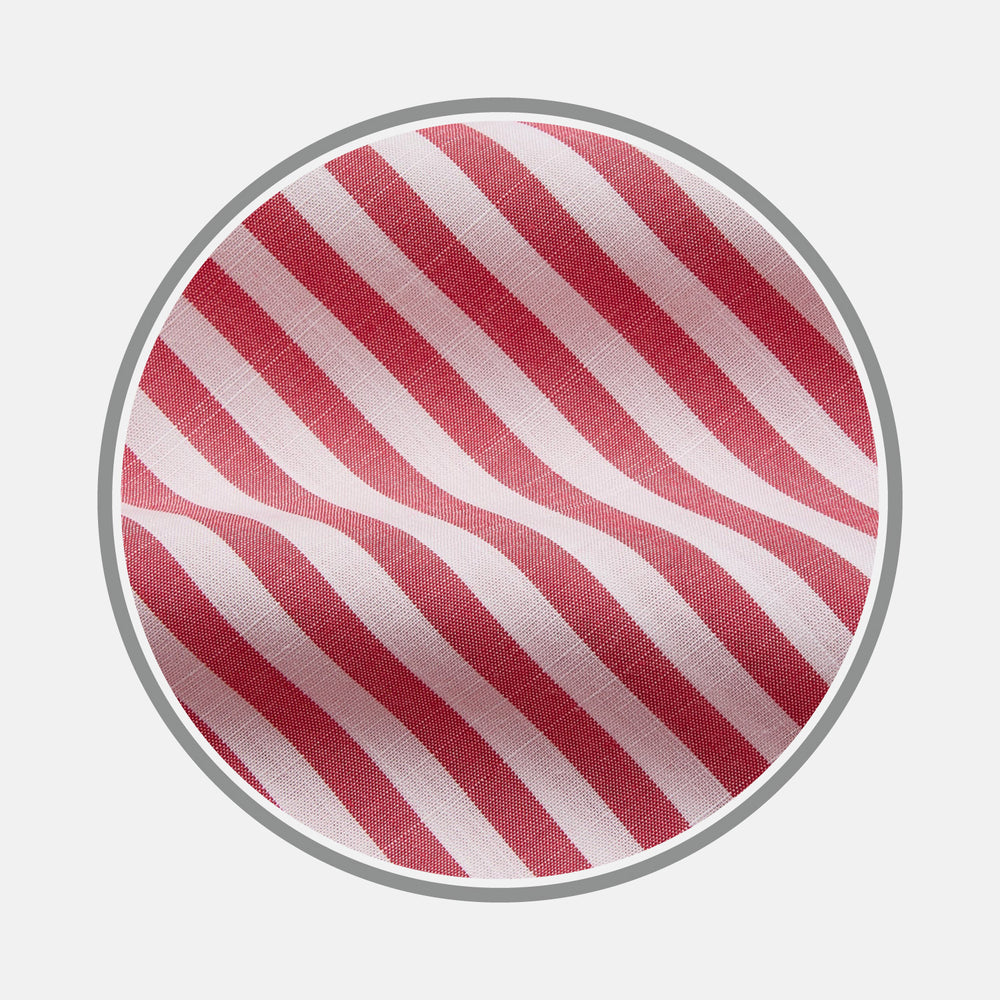 Close-up of Turnbull & Asser's Pink Candy Stripe Cotton Fabric, featuring diagonal red and white stripes, displayed within a circular frame on a plain background.