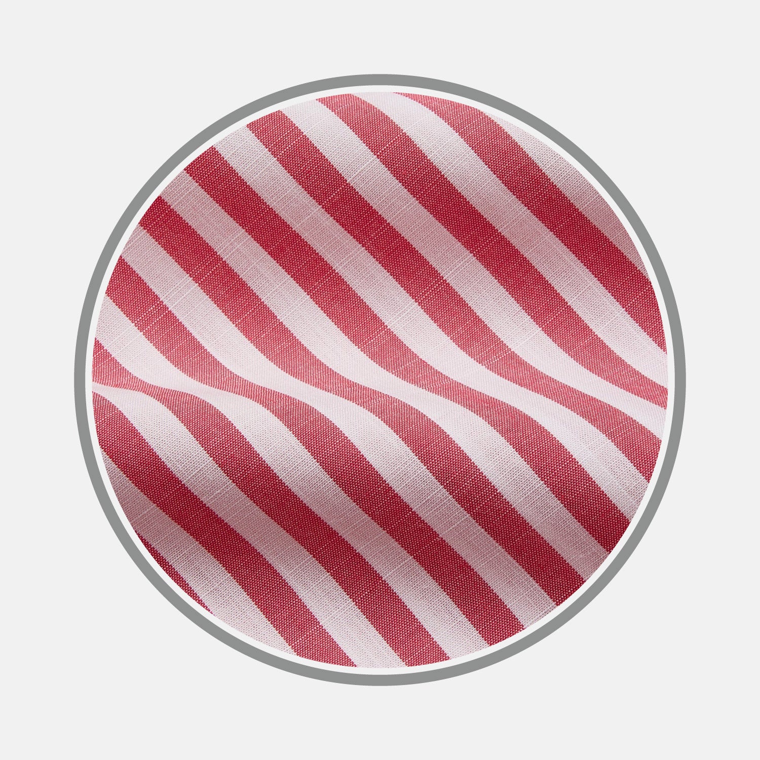 View 1 of product Close-up of Turnbull & Asser's Pink Candy Stripe Cotton Fabric, featuring diagonal red and white stripes, displayed within a circular frame on a plain background.