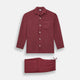 The Turnbull & Asser Burgundy Silk Pyjama Set features a long-sleeve, button-up shirt with chest pocket and matching pants with elastic waistband and side pocket, shown on a white background.