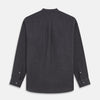 View 5 of product The Turnbull & Asser Charcoal Cotton Blend Weekend Fit Blake Shirt is a long-sleeve, stand-collar shirt with white buttons. Its minimalist design, with no pockets or patterns, makes it perfect for casual wear. Displayed flat on a white background.