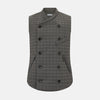 View 1 of product The Turnbull & Asser Shadow Grey Double-Breasted Quilted Gilet features a sleeveless design, asymmetrical collar, side zip pockets, slanted chest pocket, grid pattern, and modern black buttons—perfect for layered dressing.