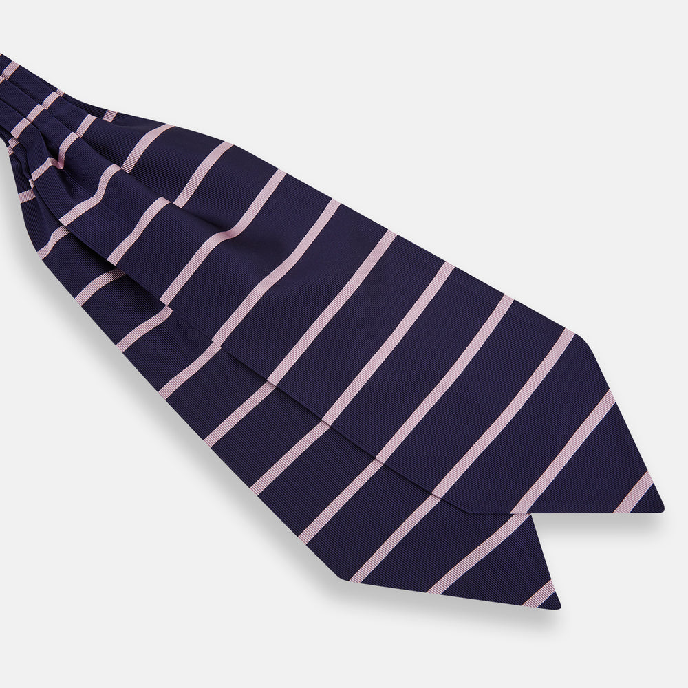 The Turnbull & Asser Pink Stripe and Navy Silk Cravat features evenly spaced light pink stripes on navy silk—a refined British style wedding accessory, elegantly displayed against a white background.