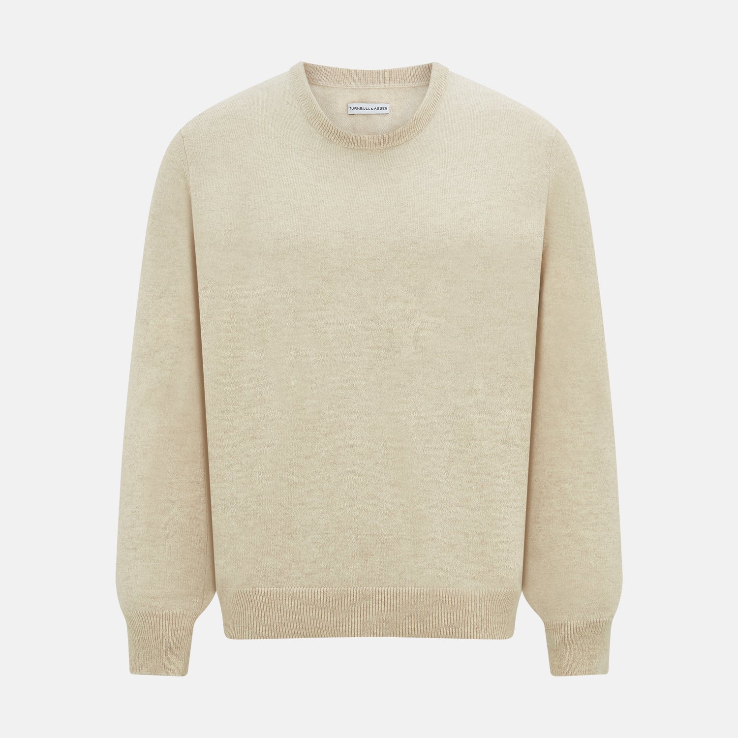 View 1 of product The Turnbull & Asser Cream Cashmere Round Neck Jumper features long sleeves, ribbed cuffs, and a ribbed hem—a versatile men’s knitwear staple, shown against a white background.