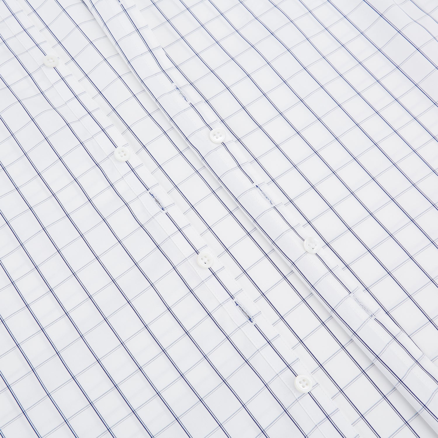 View 7 of product A Dark Navy Double-Line Checked Westminster Shirt by Turnbull & Asser, featuring button-down front, pointed collar, and buttoned cuffs—displaying British craftsmanship—laid flat on a white background.