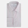 View 5 of product The Turnbull & Asser Red and Blue Multi Check Mayfair Shirt is a long-sleeve button-down made from Italian cotton with a white base and a light red and blue check pattern, shown laid flat on a white background.