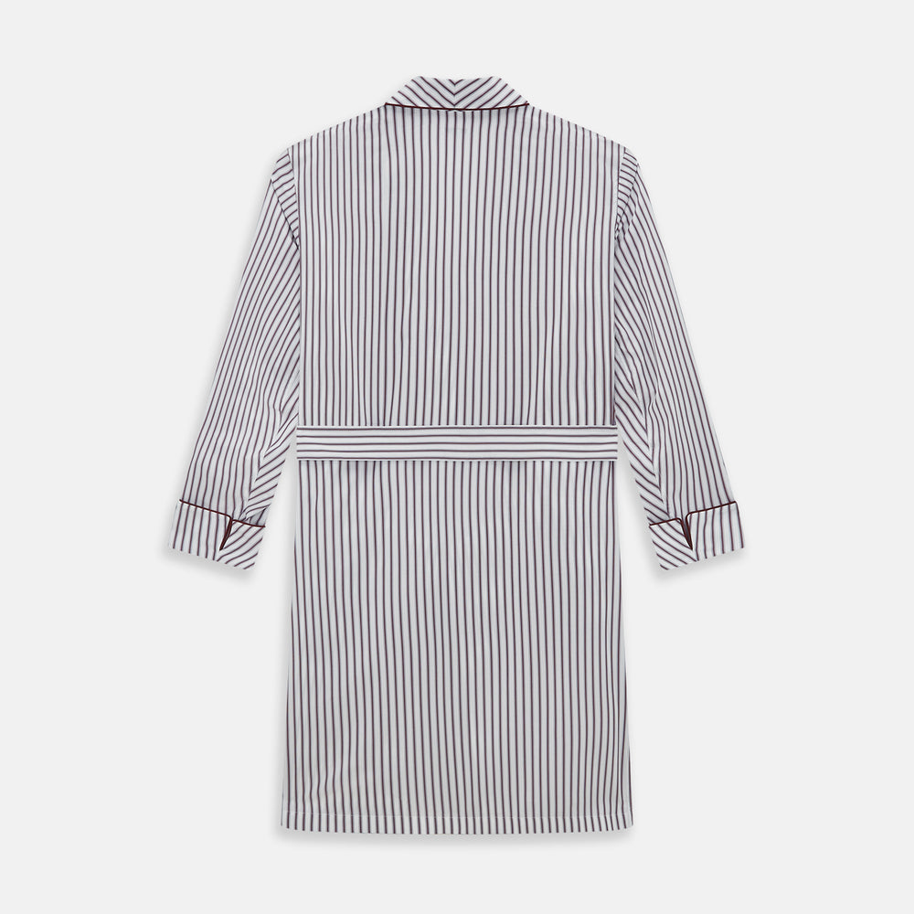 The Burgundy Multi Stripe Winston Gown by Turnbull & Asser features long sleeves, a shawl collar, waist belt, three pockets, and red piping accents for a classic Churchill-inspired touch.