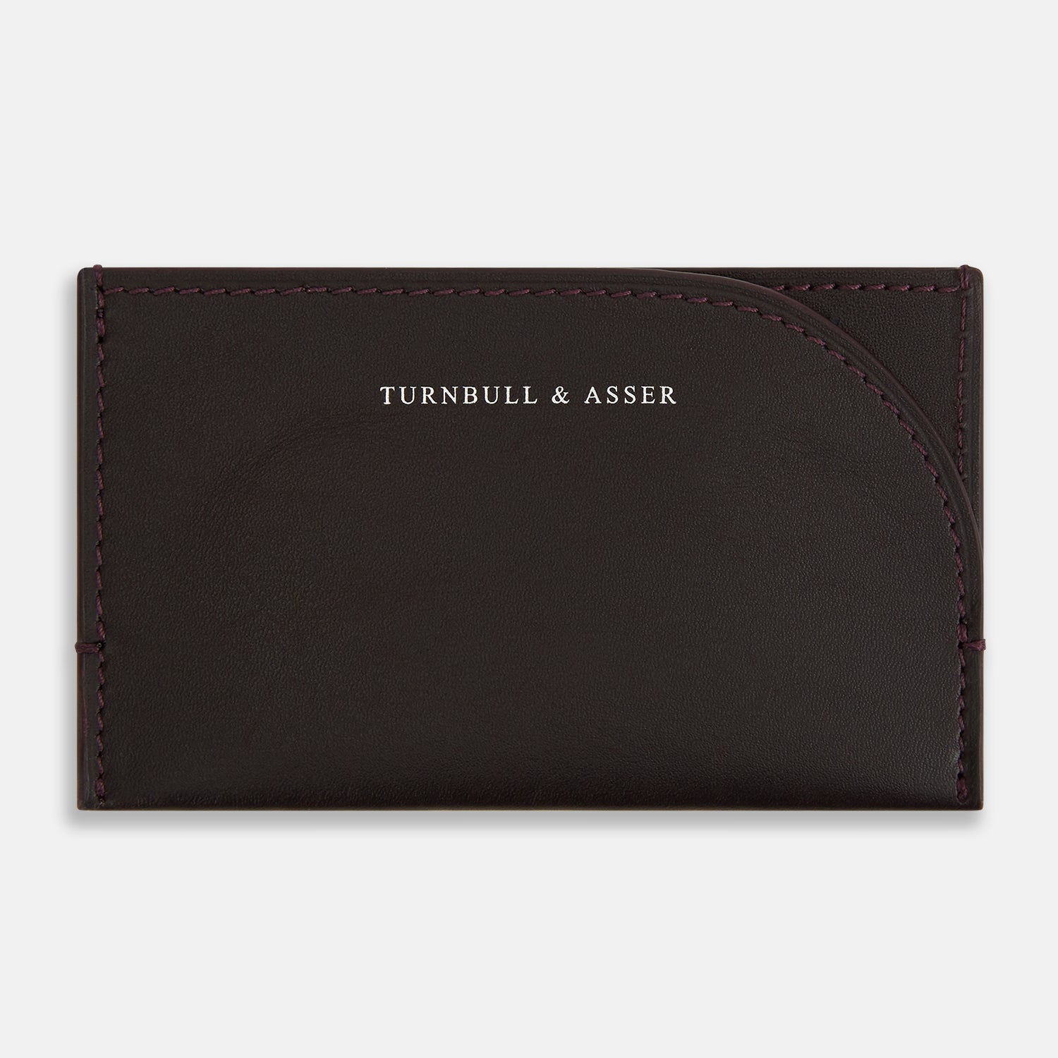 View 1 of product A burgundy leather Slim Rounded Card Case by Turnbull & Asser, featuring subtle stitching and "Turnbull & Asser" printed in white on the front.