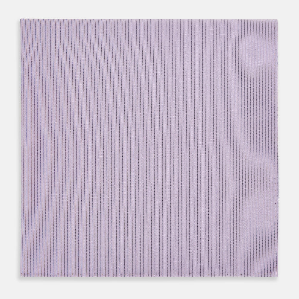The Turnbull & Asser Lilac Pinstripe Hand-Rolled Handkerchief is a neatly folded, square, lavender piece with a subtle ribbed texture and hand-rolled edges, displayed flat on a white background.
