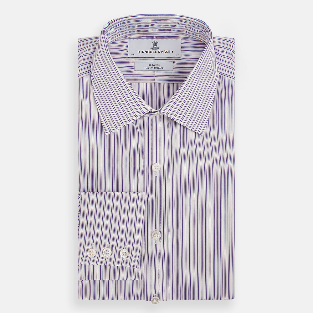 The Turnbull & Asser Purple Ticking Stripe Mayfair Shirt is a long-sleeve button-up with a T&A collar and slim blue-and-white vertical stripes, shown on a white background.