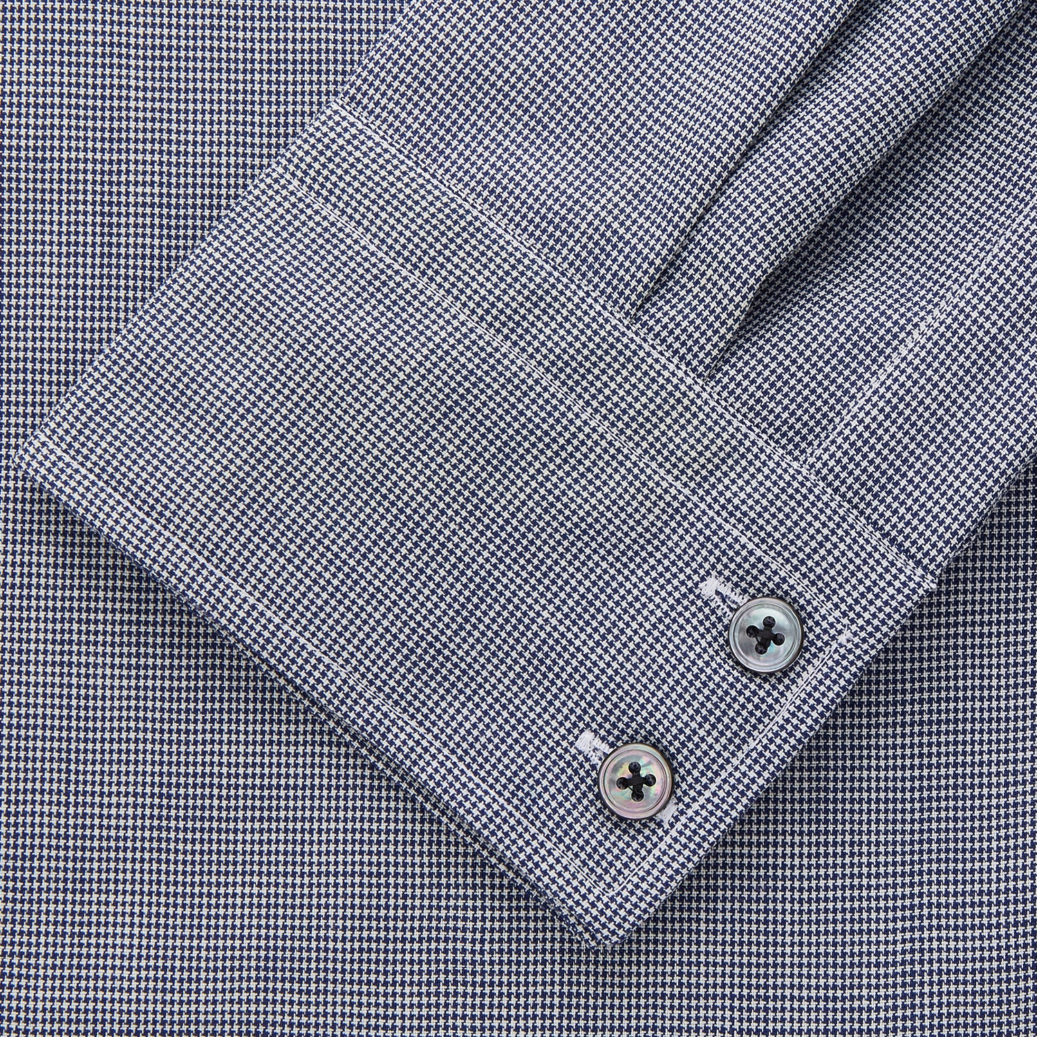 View 2 of product The Turnbull & Asser Navy Houndstooth Wool Tailored Fit Shelton Shirt features a classic collar, buttoned cuffs, and a refined tailored fit, shown laid flat on a white background.