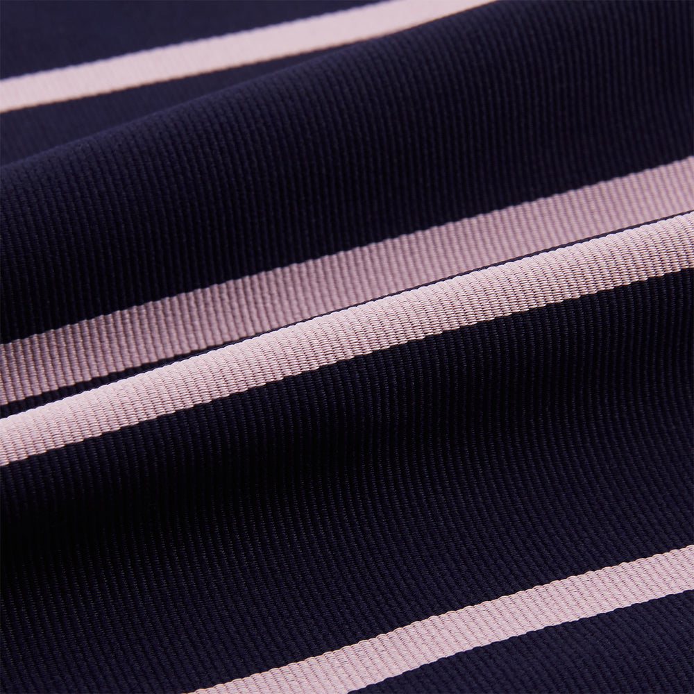 The Turnbull & Asser Pink Stripe and Navy Silk Cravat features evenly spaced light pink stripes on navy silk—a refined British style wedding accessory, elegantly displayed against a white background.