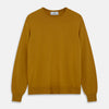 View 1 of product The Turnbull & Asser Gold Crew Neck Merino Jumper, featuring long sleeves and ribbed cuffs and hem, is displayed flat on a white background.