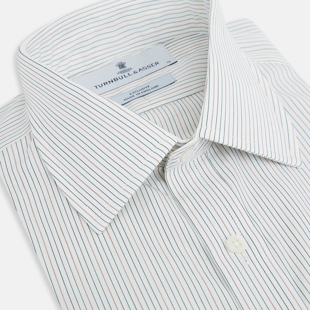 The Petrol Hairline Stripe Mayfair Shirt by Turnbull & Asser is a long-sleeved, button-up Italian cotton shirt with a subtle blue pinstripe, classic T&A collar, and buttoned cuffs, shown flat on a white background.