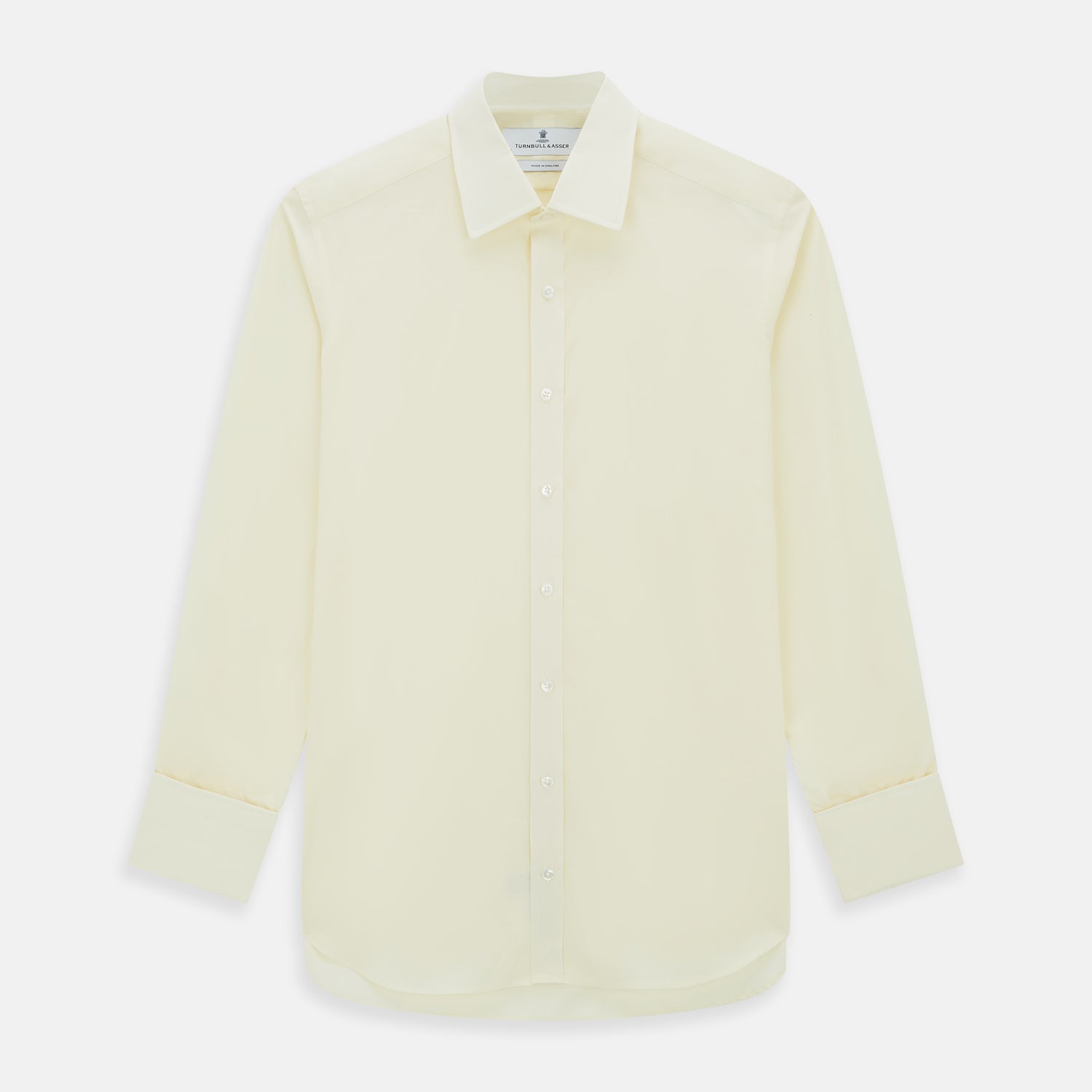 View 1 of product The Cream Cotton Shirt with T&A Collar and Double Cuffs by Turnbull & Asser is shown laid flat on a white background.