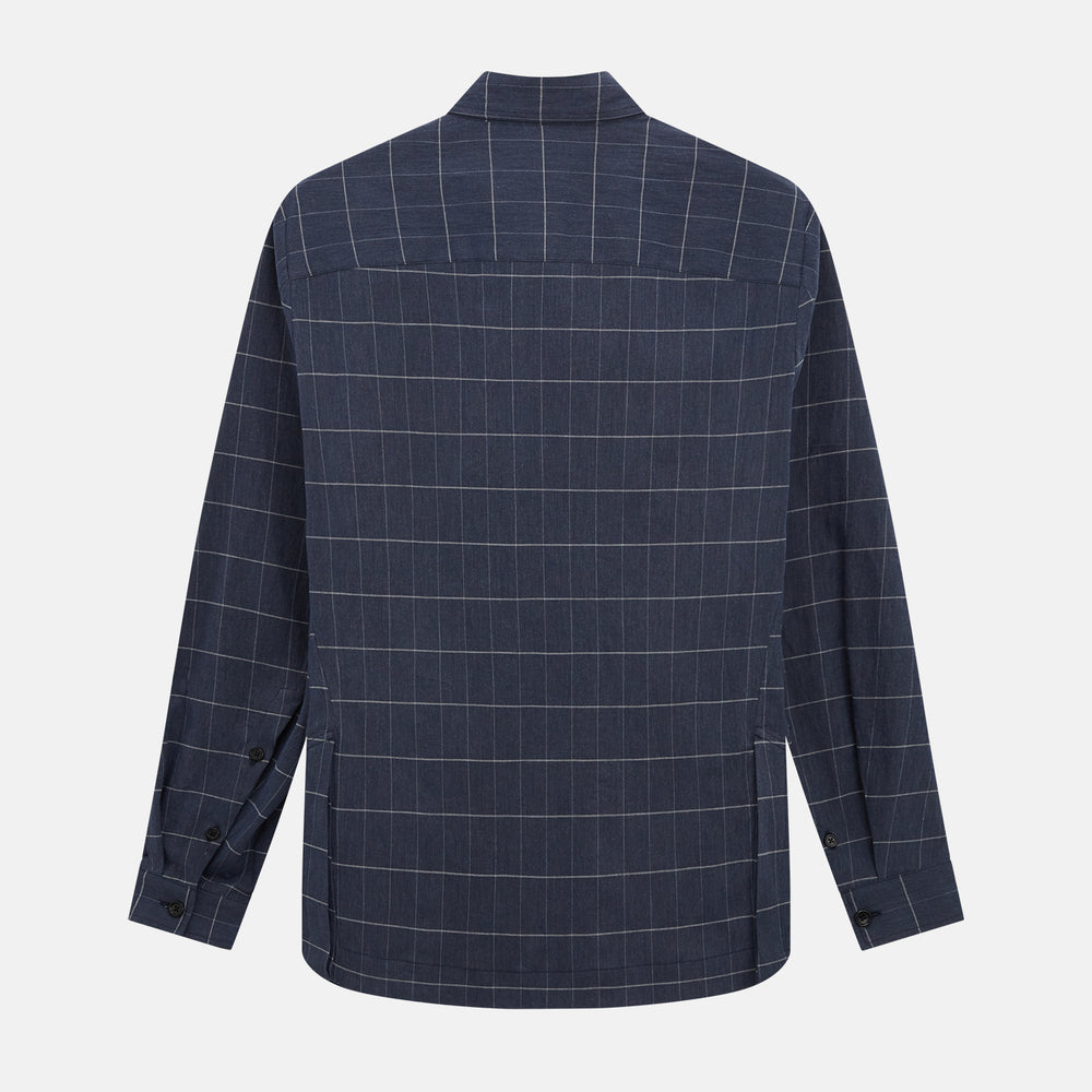 The Turnbull & Asser Royal Blue Check Hampstead Overshirt features a white windowpane pattern, long sleeves, two front pockets, and a chest pocket, displayed on a plain white background for an elegant classic look.
