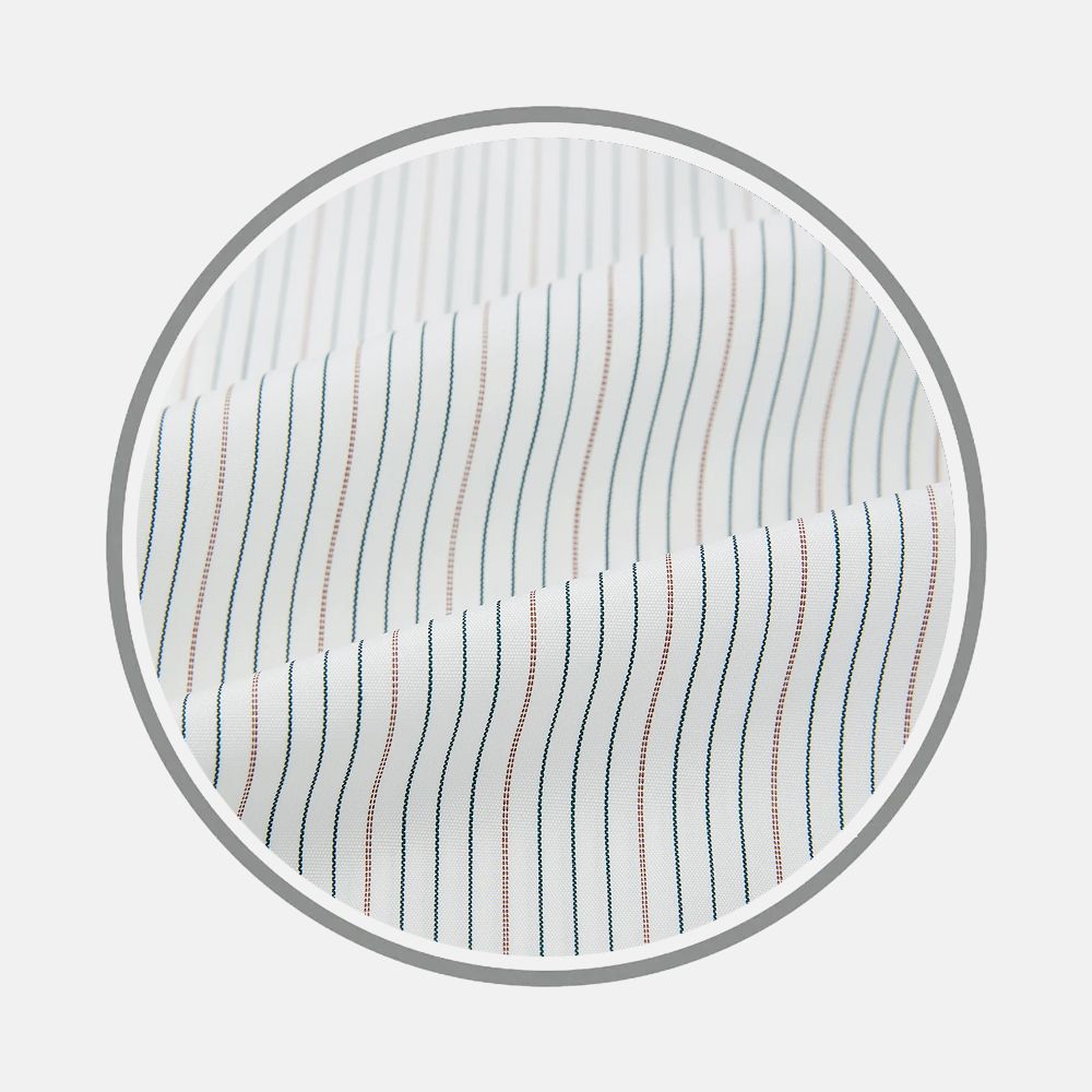Close-up of Petrol Hairline Stripe Fabric by Turnbull & Asser, featuring thin, evenly spaced vertical blue and red stripes on white, shown within a circular frame against a plain light background.