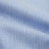 View 5 of product The Turnbull & Asser Pale Blue Cotton Cashmere Dorset Collar Richmond Shirt features long sleeves, a button-down collar, white buttons, and a chest pocket. It is neatly displayed flat on a white background.