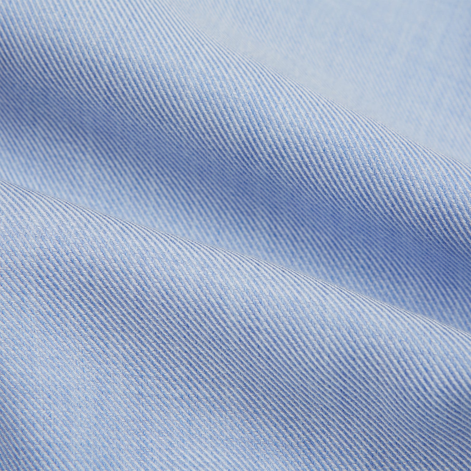 View 5 of product The Turnbull & Asser Pale Blue Cotton Cashmere Dorset Collar Richmond Shirt features long sleeves, a button-down collar, white buttons, and a chest pocket. It is neatly displayed flat on a white background.