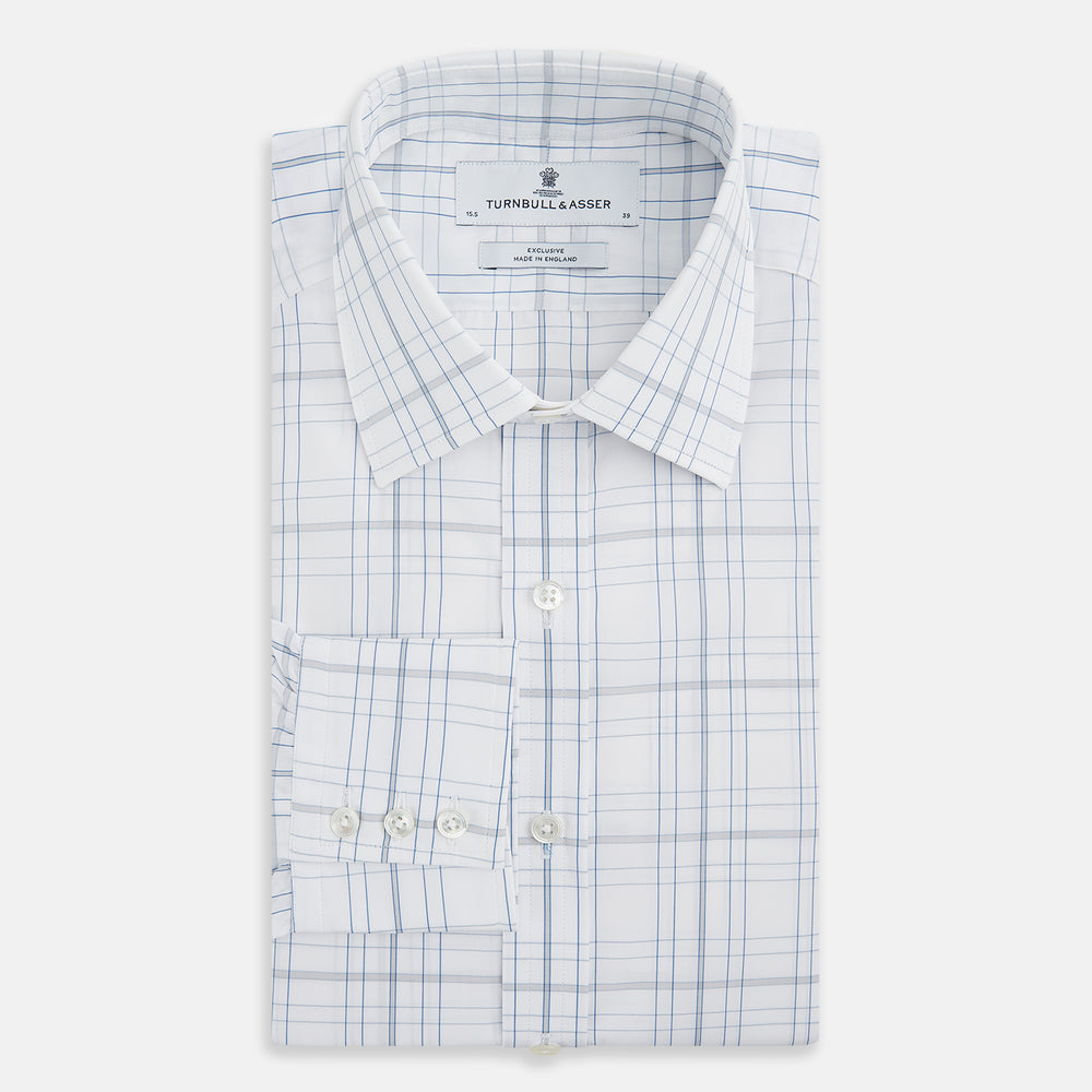 The Turnbull & Asser Blue and Grey Multi Check Mayfair Shirt features a T&A collar, cuffed long sleeves, and a light blue and gray plaid pattern on white.