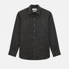 View 1 of product The Ash Linen Windsor Shirt by Turnbull & Asser is a long-sleeve, button-up black shirt with a Windsor collar and cuffs, reflecting British craftsmanship, shown on a plain white background.