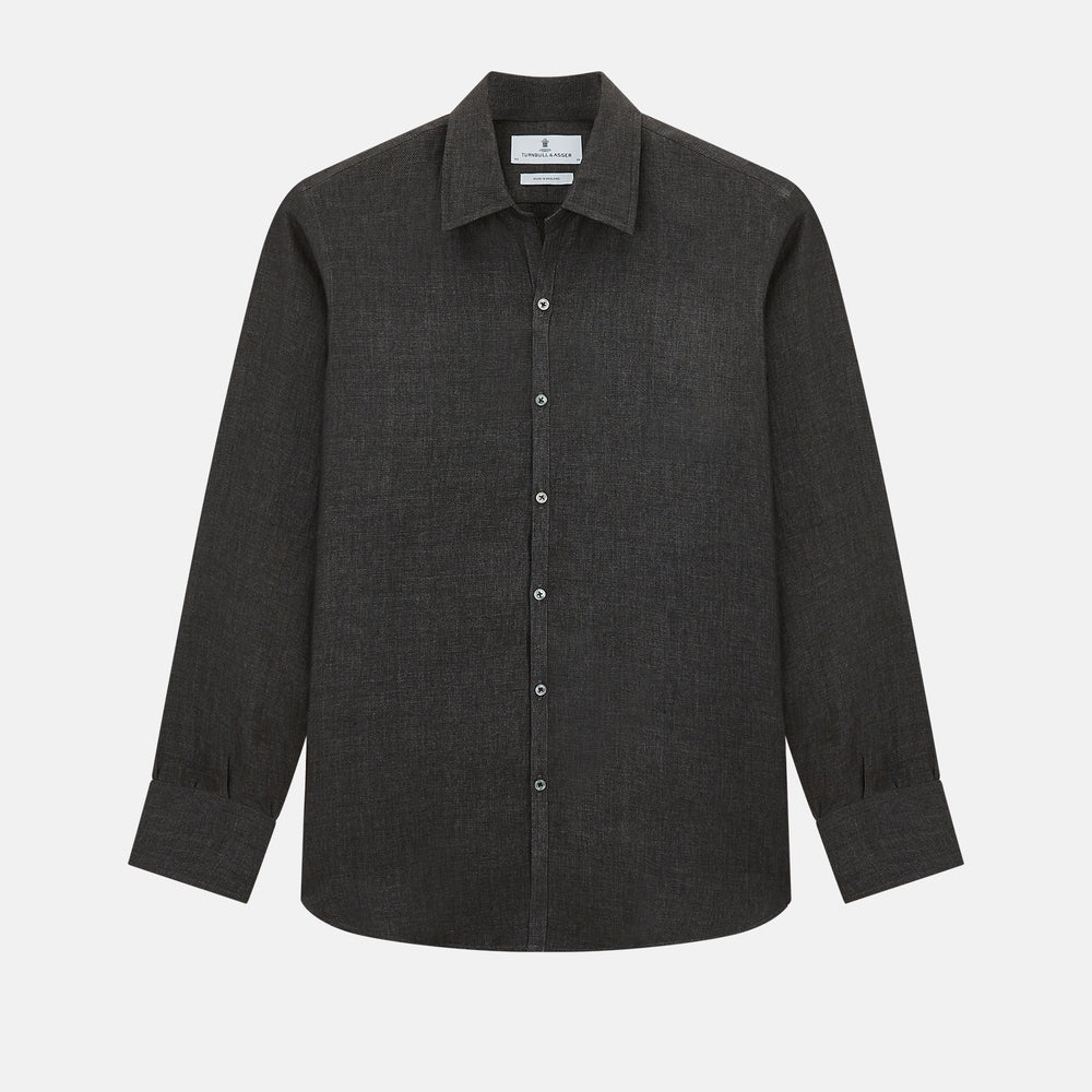The Ash Linen Windsor Shirt by Turnbull & Asser is a long-sleeve, button-up black shirt with a Windsor collar and cuffs, reflecting British craftsmanship, shown on a plain white background.