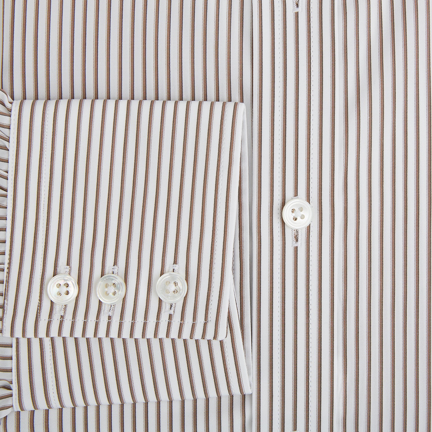 View 4 of product The Coffee Shadow Stripe Mayfair Shirt by Turnbull & Asser is a long-sleeve, button-down style with a T&A collar and fine beige and white stripes, crafted from premium Italian cotton and shown on a white background.