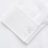 View 4 of product The Turnbull & Asser White Weekend Fit Linen Finch Shirt features a Derby collar and chest pocket, laid flat on a white background—an effortlessly classic choice for casual weekends.