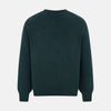 View 3 of product The Turnbull & Asser Forest Green Cashmere V-Neck Jumper features long sleeves, ribbed cuffs, collar, and hem. Shown against a white background, it's a classic knitwear piece ideal for layering.