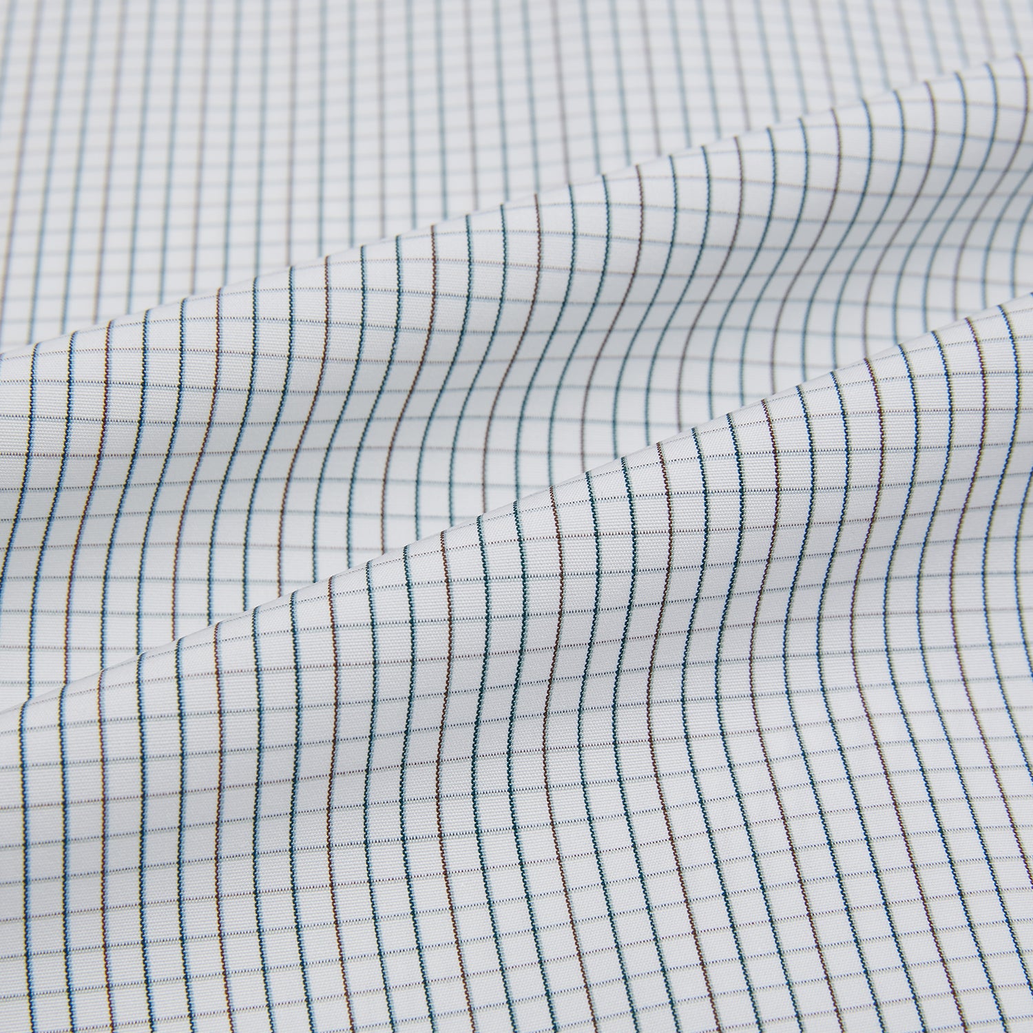 View 6 of product A Forest Melange and Red Graph Check Mayfair Shirt by Turnbull & Asser, featuring a classic T&A collar, button-down front, and buttoned cuffs, crafted from fine Italian cotton and shown on a plain white background.