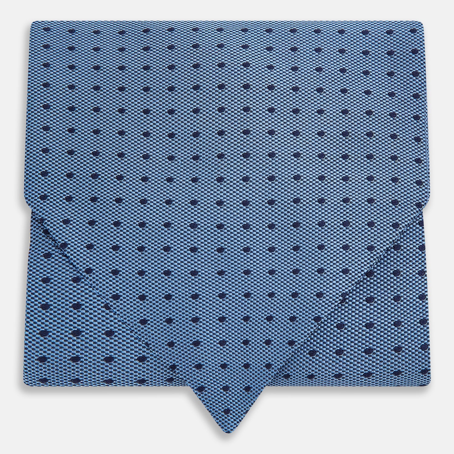 View 1 of product The Turnbull & Asser Navy and Blue Micro Dot Silk Cravat, featuring a refined dot pattern, makes an elegant statement when paired with a matching pocket square, showcased here against a white background.