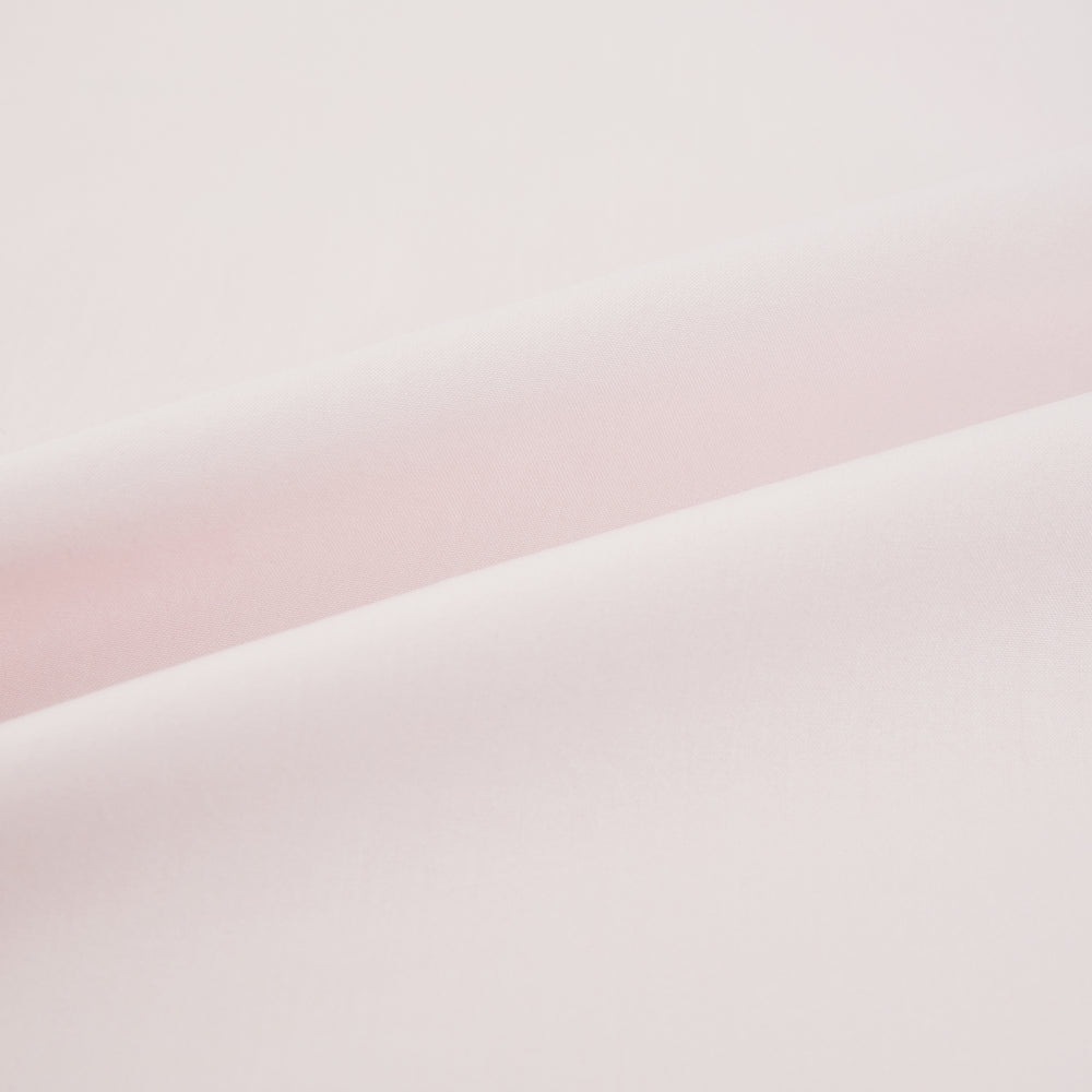 The Soft Pink Mayfair Shirt by Turnbull & Asser is a long-sleeved, sanforised cotton button-up with a classic collar, white buttons, and buttoned cuffs, shown against a plain white background.