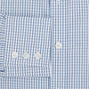 View 4 of product The Sky Blue Micro Shadow Check Mayfair Shirt by Turnbull & Asser features long sleeves, a classic collar, buttoned cuffs, and a light blue and white micro check pattern—showcasing refined British craftsmanship.